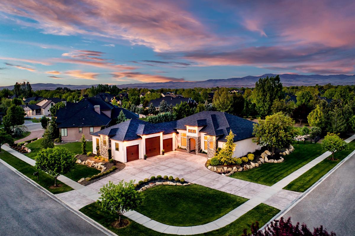 REMARKABLE SINGLE LEVEL ESTATE ON A PRISTINE CORNER LOT
