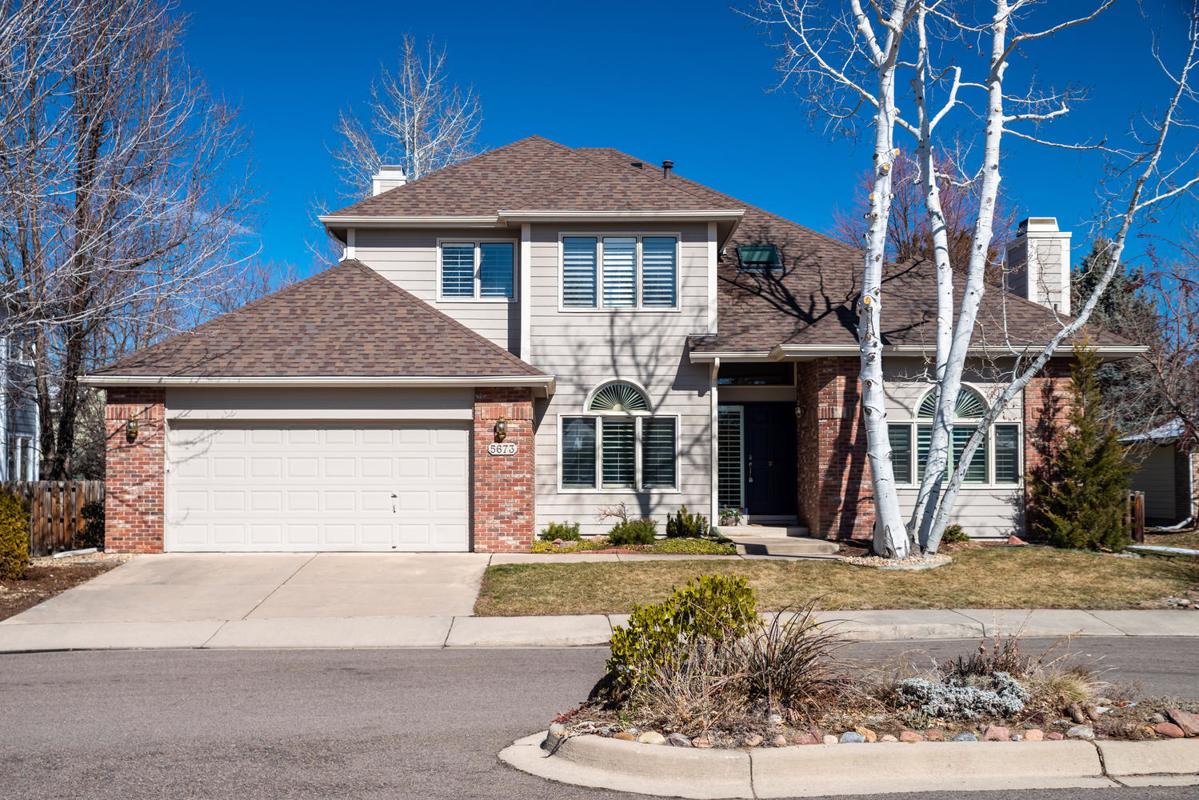 IMPECCABLE TWO-STORY ON A QUIET CUL-DE-SAC