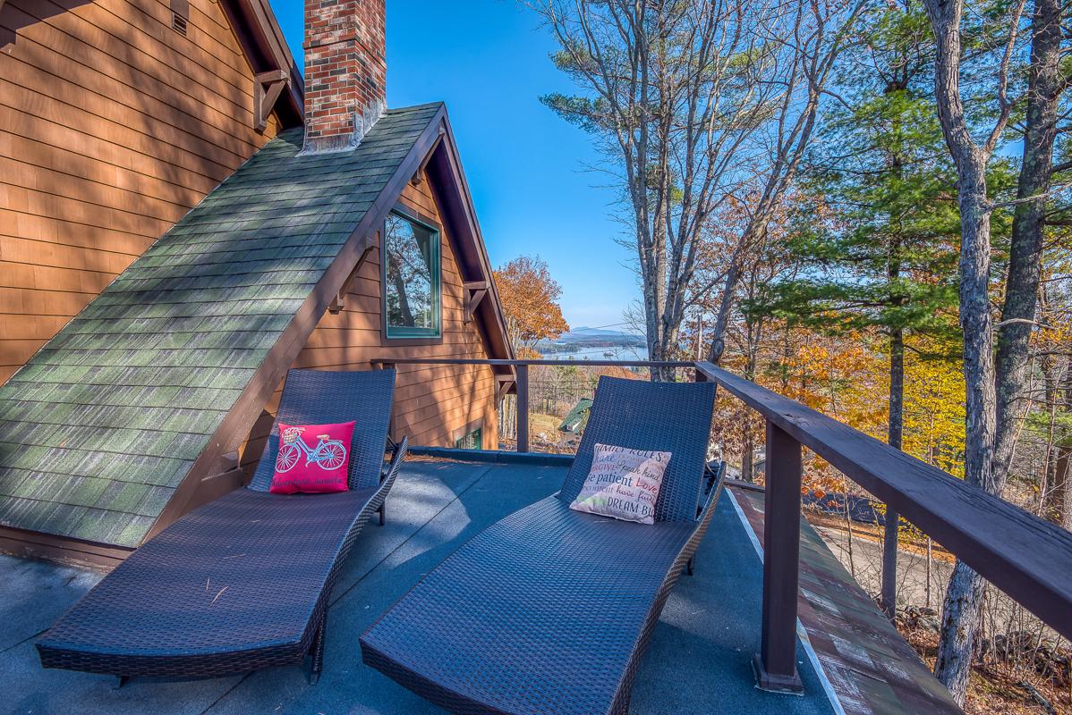 CUSTOMBUILT HOME WITH CAPTIVATING VIEWS OF SQUAM LAKE New Hampshire