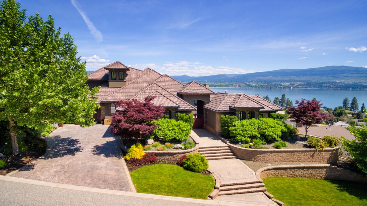 LUXURIOUS HOME WITH PANORAMIC LAKE VIEWS