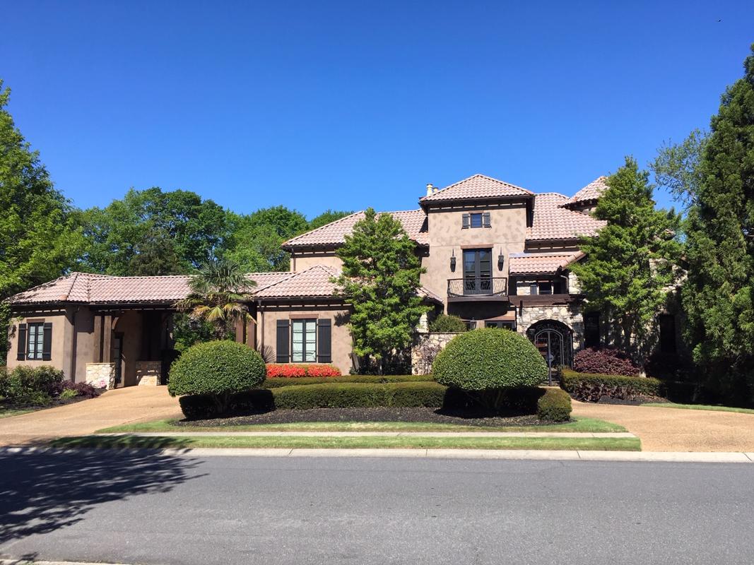 ELEGANT HOME WITH INTRICATE DETAILS OF QUALITY THROUGHOUT North