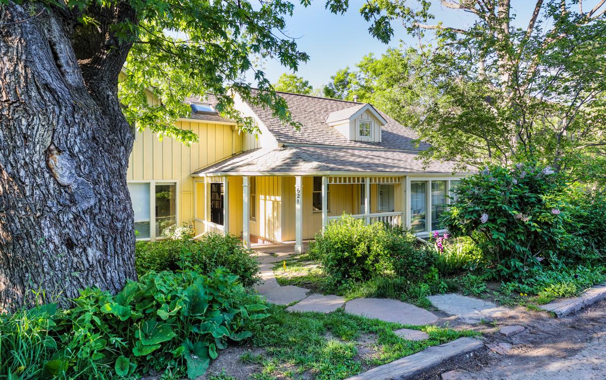 CHARMING HOME BRIMMING WITH CHARACTER ON A BEAUTIFUL LOT WITH FLATIRON VIEWS