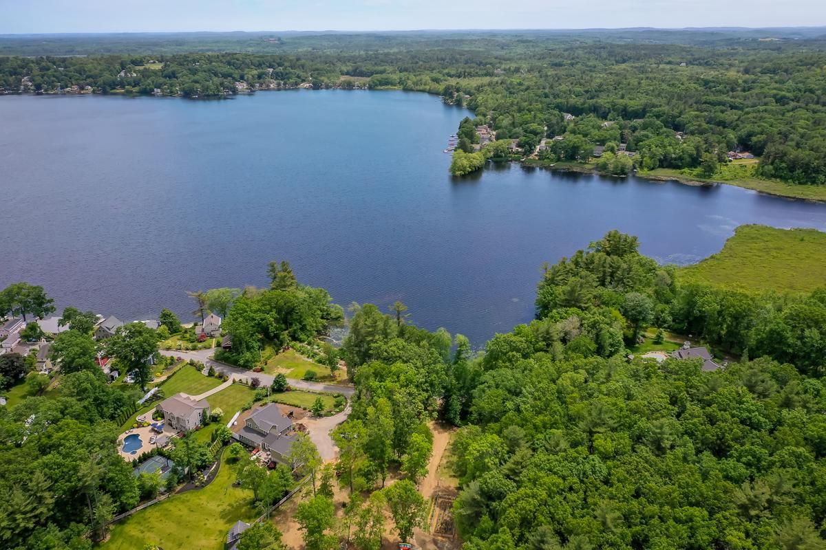 MAGNIFICENT COLONIAL WITH VIEWS OF LAKE ATTITASH AND ENTERTAINERS DREAM