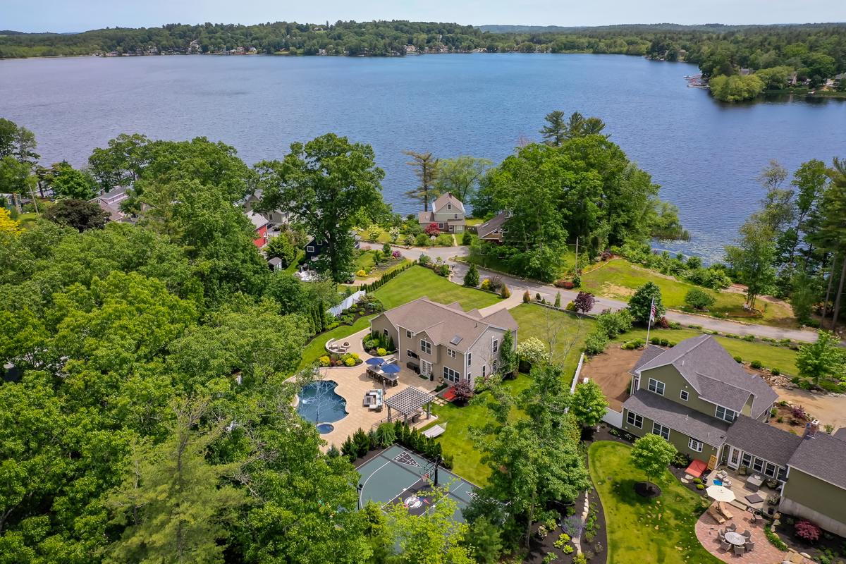 MAGNIFICENT COLONIAL WITH VIEWS OF LAKE ATTITASH AND ENTERTAINERS DREAM