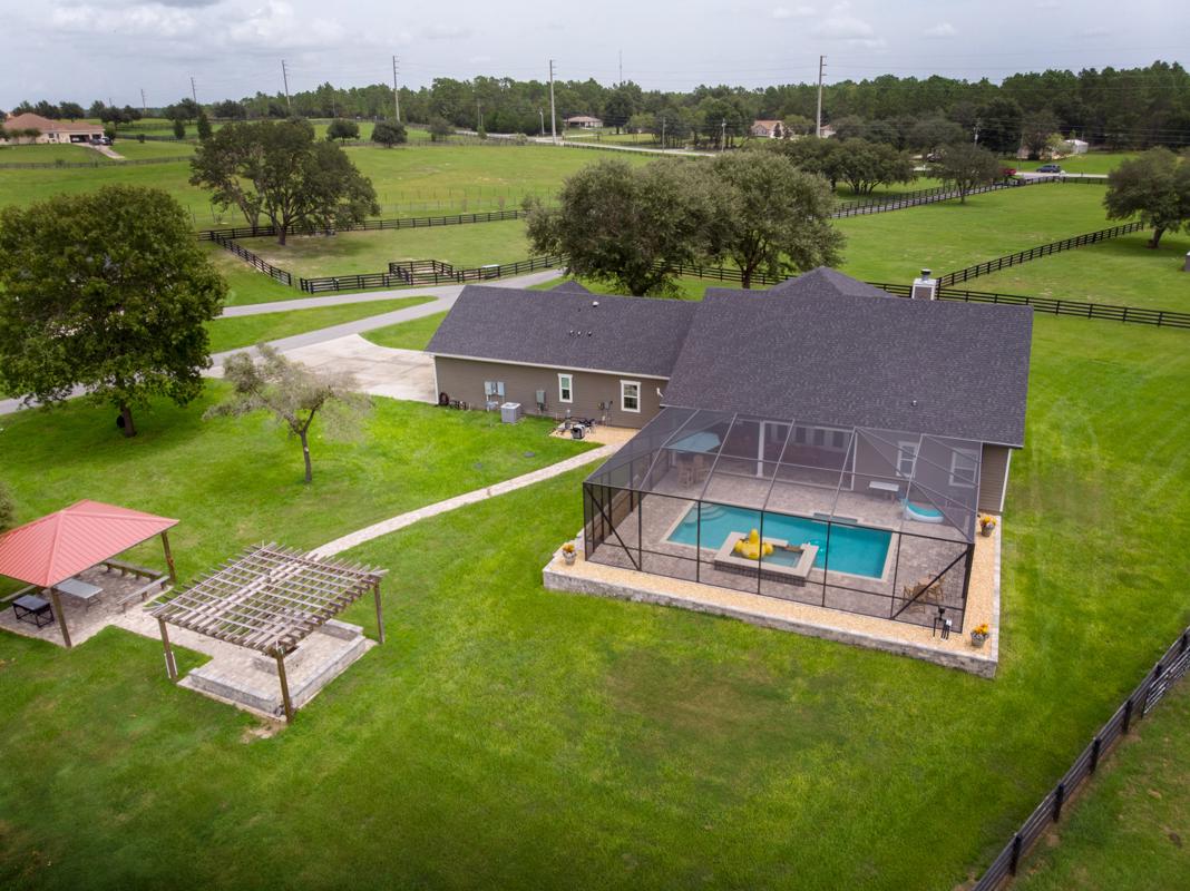 CUSTOM FARMHOUSE ON 10 ACRE RANCH Florida Luxury Homes Mansions For