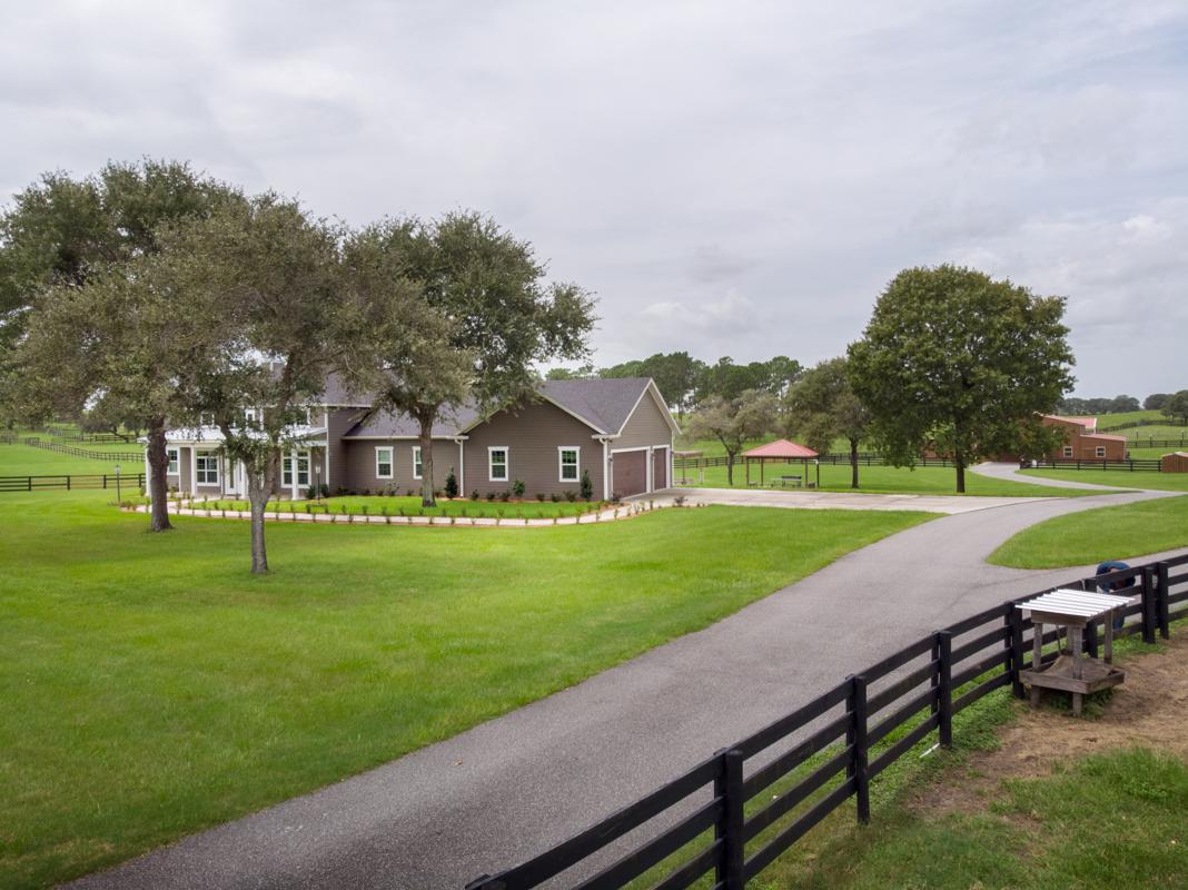 CUSTOM FARMHOUSE ON 10 ACRE RANCH Florida Luxury Homes Mansions For