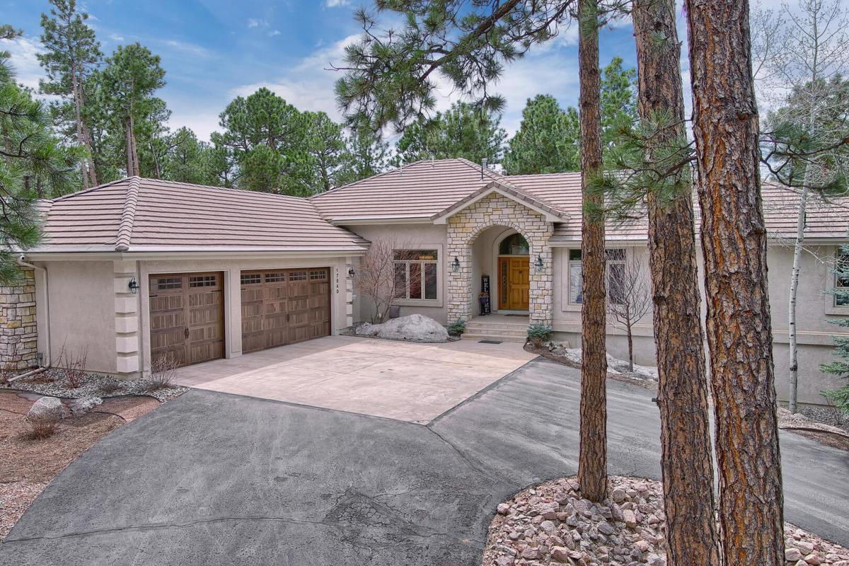 CUSTOM HOME POISED ON AN ELEVATED 2.5 ACRES