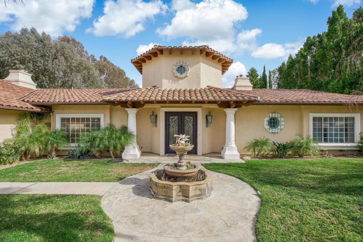 A TRUE ESTATE SET ON TWO ACRES